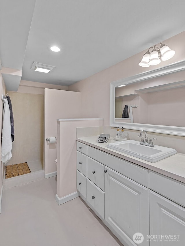7510 Fauntleroy Way SW, Seattle, WA 98136 - bathroom featuring vanity, toilet, and recessed lighting