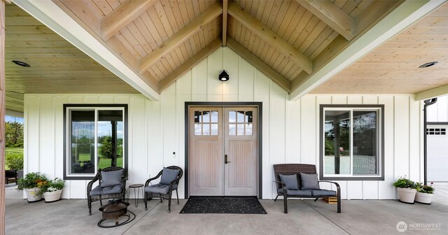 2495 River Rock Dr, Everson, WA 98247 - view of exterior entry with board and batten siding and a porch