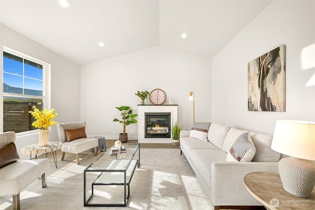 710 E 4th St, Nooksack, WA 98276 - living room featuring lofted ceiling, recessed lighting, and a glass covered fireplace