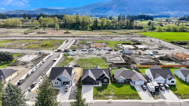 710 E 4th St, Nooksack, WA 98276 - aerial view of residential area featuring mountains