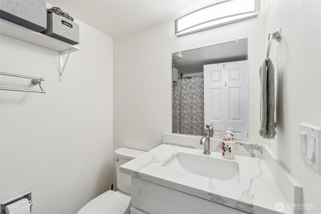 903 N 130th St Unit 113, Seattle, WA 98133 - bathroom with vanity and toilet