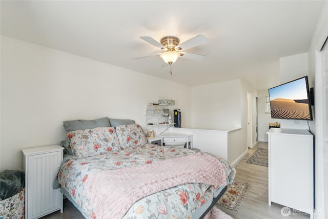 903 N 130th St Unit 113, Seattle, WA 98133 - bedroom with wood finished floors and a ceiling fan