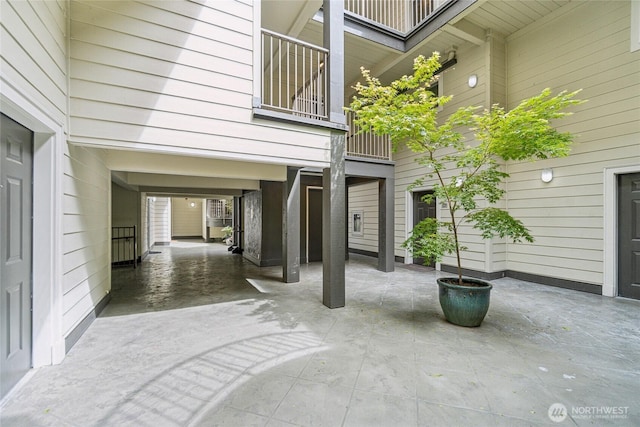 903 N 130th St Unit 113, Seattle, WA 98133 - view of patio / terrace featuring a carport