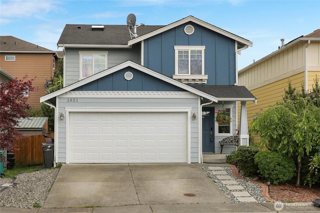 1921 76th Ave SE, Lake Stevens, WA 98258 - traditional-style home with concrete driveway, board and batten siding, a garage, and a shingled roof
