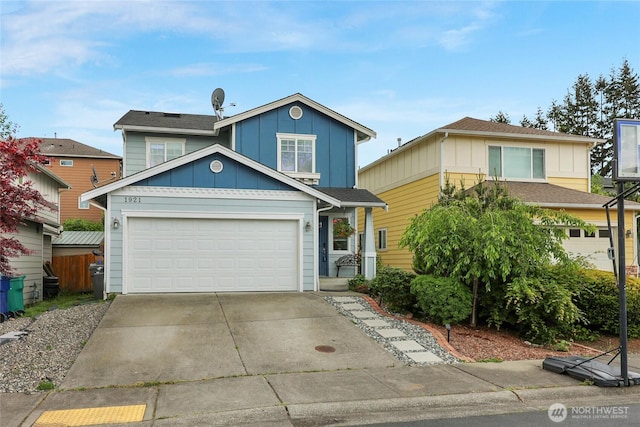 1921 76th Ave SE, Lake Stevens, WA 98258 - traditional-style home with board and batten siding, driveway, and an attached garage