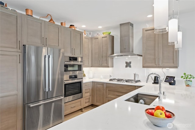 4907 Main St Unit 107, Tacoma, WA 98407 - kitchen with stainless steel appliances, wall chimney exhaust hood, a sink, light countertops, and recessed lighting