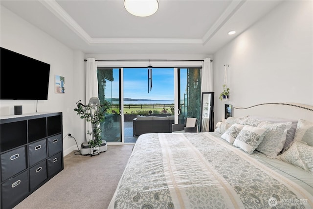 4907 Main St Unit 107, Tacoma, WA 98407 - carpeted bedroom featuring access to exterior, a tray ceiling, and baseboards