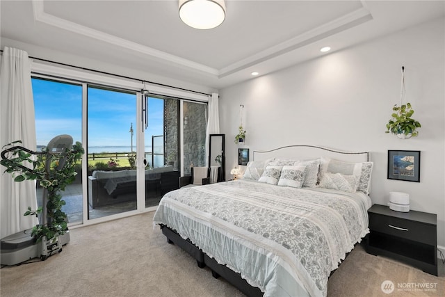 4907 Main St Unit 107, Tacoma, WA 98407 - bedroom featuring a tray ceiling, carpet floors, access to exterior, and recessed lighting