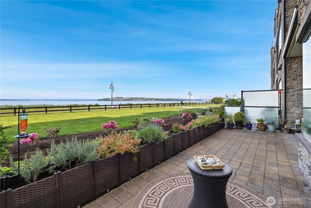 4907 Main St Unit 107, Tacoma, WA 98407 - view of patio featuring a water view