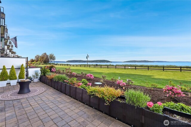 4907 Main St Unit 107, Tacoma, WA 98407 - view of patio featuring a water view