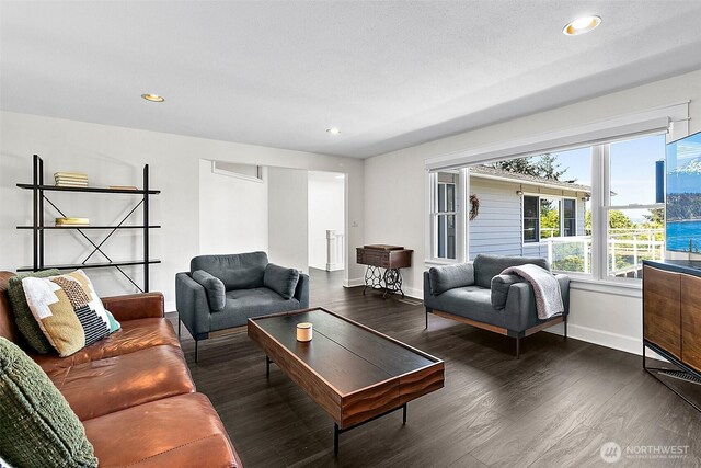5758 Overlook Ave NE, Tacoma, WA 98422 - living area featuring wood finished floors, baseboards, and recessed lighting