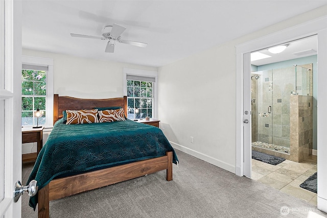 5758 Overlook Ave NE, Tacoma, WA 98422 - bedroom with baseboards, connected bathroom, and ceiling fan
