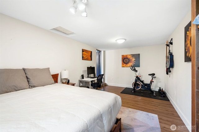 22002 129th Pl SE, Kent, WA 98031 - bedroom featuring wood finished floors and baseboards