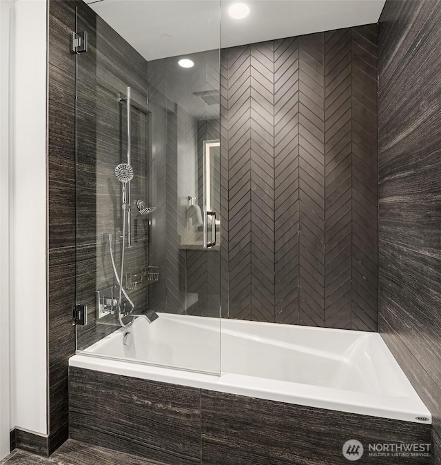 188 Bellevue Way NE Unit 307, Bellevue, WA 98004 - full bath with a stall shower, a relaxing tiled tub, and recessed lighting