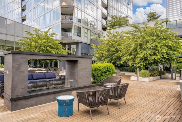 188 Bellevue Way NE Unit 307, Bellevue, WA 98004 - wooden terrace featuring an outdoor hangout area