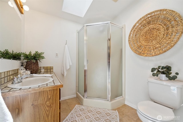 35029 37th Ave S, Auburn, WA 98001 - full bathroom with a skylight, tile patterned flooring, a shower stall, and vanity
