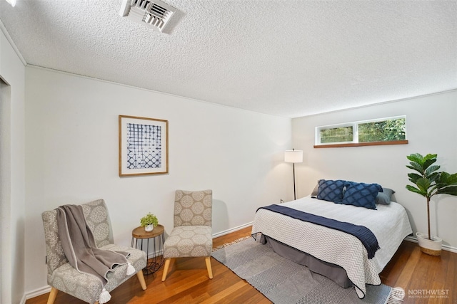35029 37th Ave S, Auburn, WA 98001 - bedroom featuring wood finished floors and a textured ceiling