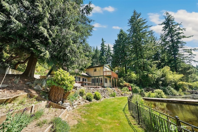 35029 37th Ave S, Auburn, WA 98001 - view of yard with a deck, a garden, stairs, and a view of trees