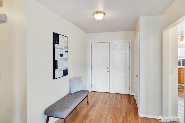 7407 143rd Avenue Ct E, Sumner, WA 98390 - entrance foyer with light wood-style floors and baseboards