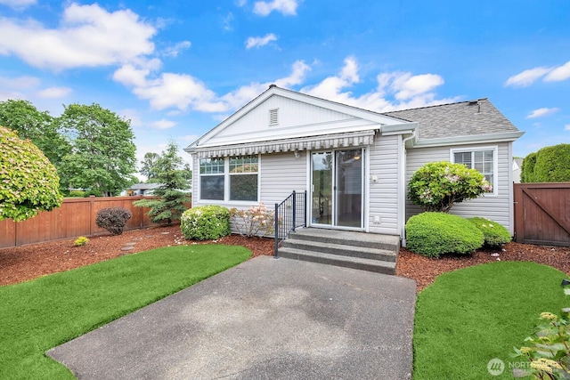 7407 143rd Avenue Ct E, Sumner, WA 98390 - view of front of house featuring a shingled roof