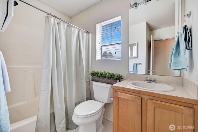 7407 143rd Avenue Ct E, Sumner, WA 98390 - bathroom with toilet, vanity, and shower / bathtub combination with curtain