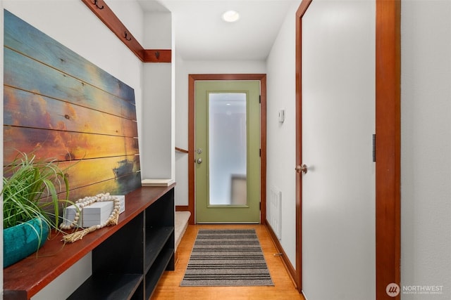 672 NE 40th St, Seattle, WA 98105 - entryway with light wood finished floors, recessed lighting, and baseboards