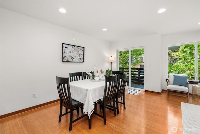 672 NE 40th St, Seattle, WA 98105 - dining space with light wood-style flooring, baseboards, and recessed lighting