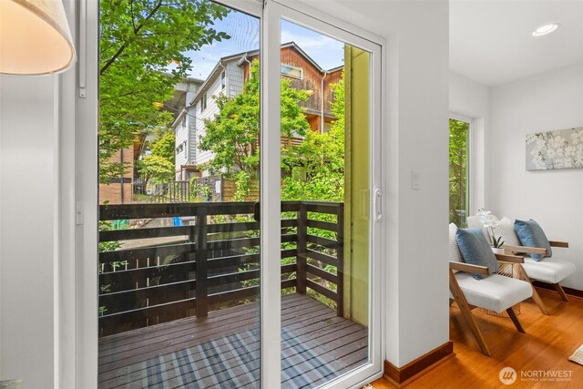 672 NE 40th St, Seattle, WA 98105 - entryway with wood finished floors, baseboards, and recessed lighting
