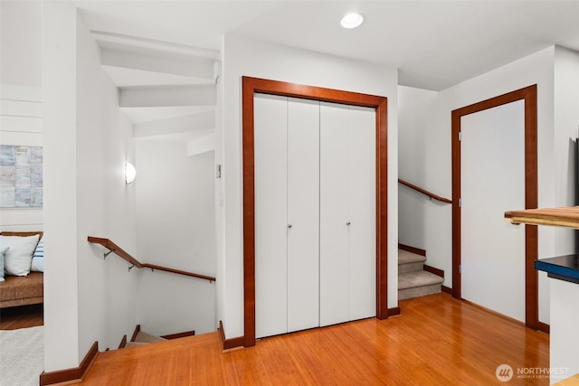 672 NE 40th St, Seattle, WA 98105 - stairs with wood finished floors and recessed lighting