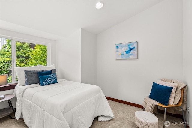 672 NE 40th St, Seattle, WA 98105 - carpeted bedroom with baseboards and vaulted ceiling