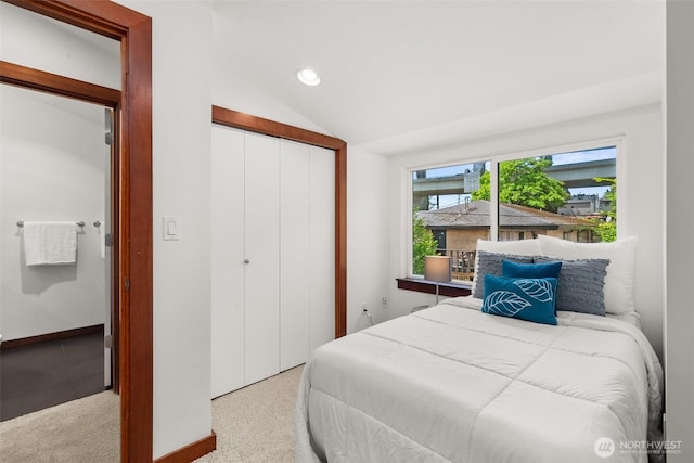 672 NE 40th St, Seattle, WA 98105 - bedroom with a closet, recessed lighting, vaulted ceiling, and baseboards