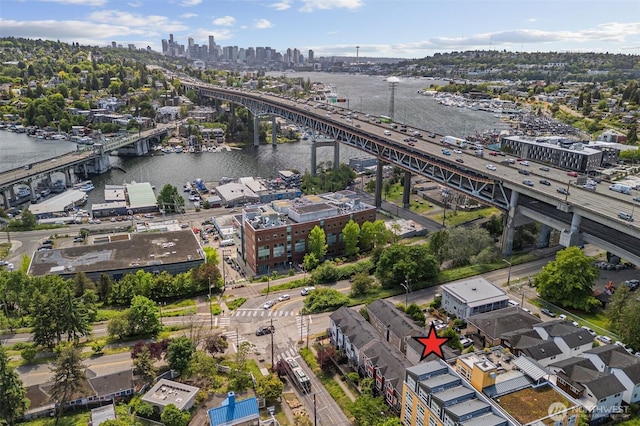 672 NE 40th St, Seattle, WA 98105 - bird's eye view of a notable bridge, skyline, a highway, and a nearby body of water