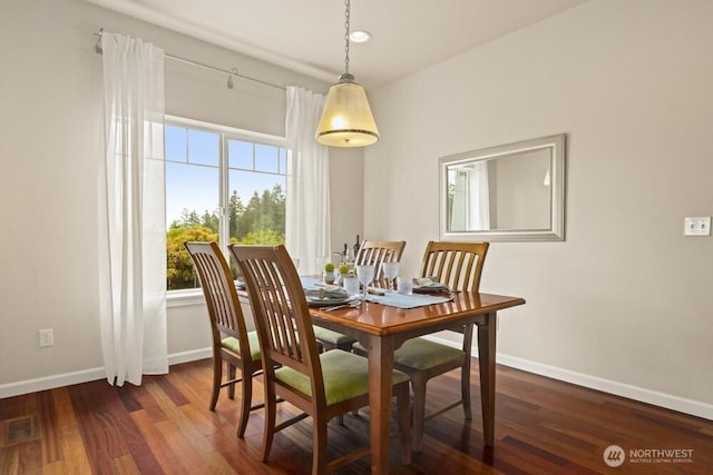 3707 Simmons Heights Ln SW, Tumwater, WA 98512 - dining room featuring baseboards and dark wood-style flooring