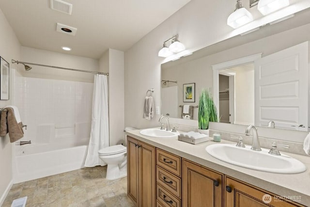 3707 Simmons Heights Ln SW, Tumwater, WA 98512 - bathroom featuring shower / tub combo with curtain, double vanity, toilet, and stone finish floors