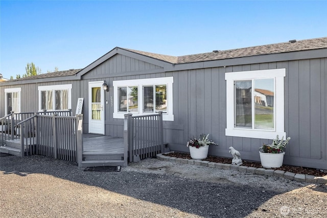 3327 Firouzi Dr NE, Moses Lake, WA 98837 - view of front of house with roof with shingles and a wooden deck