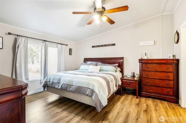 3327 Firouzi Dr NE, Moses Lake, WA 98837 - bedroom featuring vaulted ceiling, crown molding, wood finished floors, a ceiling fan, and baseboards