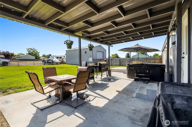 3327 Firouzi Dr NE, Moses Lake, WA 98837 - view of patio featuring outdoor dining space, a hot tub, and an outbuilding
