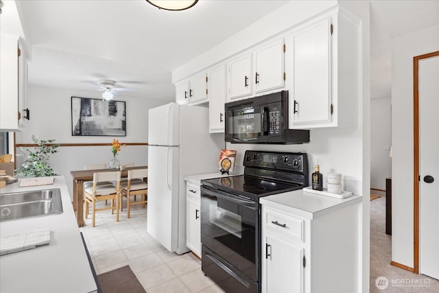 4824 237th Pl SE, Bothell, WA 98021 - kitchen with black appliances, light countertops, white cabinetry, a ceiling fan, and a sink