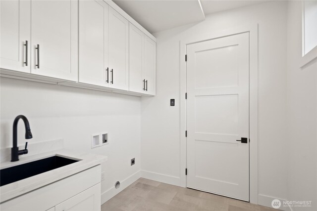 20519 Benson Ridge Ln, Mount Vernon, WA 98274 - laundry room featuring hookup for a washing machine, cabinet space, electric dryer hookup, baseboards, and light wood-style floors