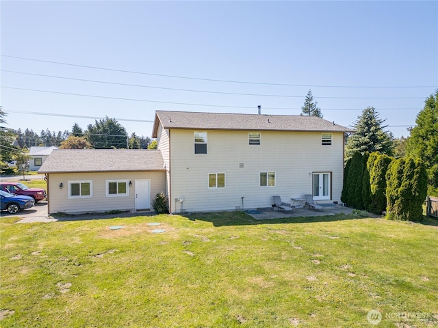 1160 Cays Rd, Sequim, WA 98382 - back of property with a lawn, a patio, and entry steps