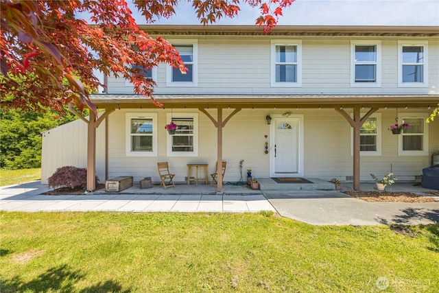 1160 Cays Rd, Sequim, WA 98382 - view of front of house featuring a front lawn and covered porch