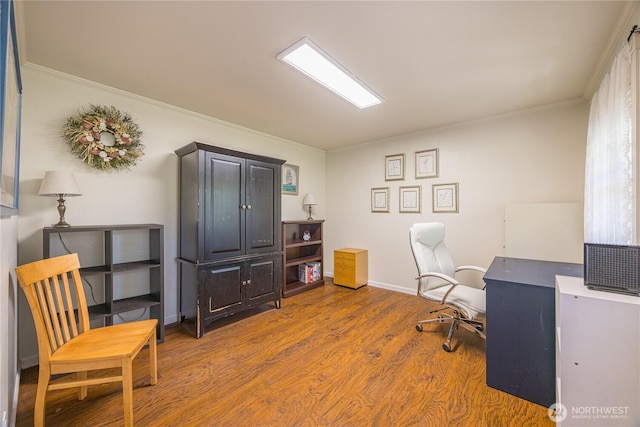 1160 Cays Rd, Sequim, WA 98382 - office area featuring wood finished floors, crown molding, and baseboards