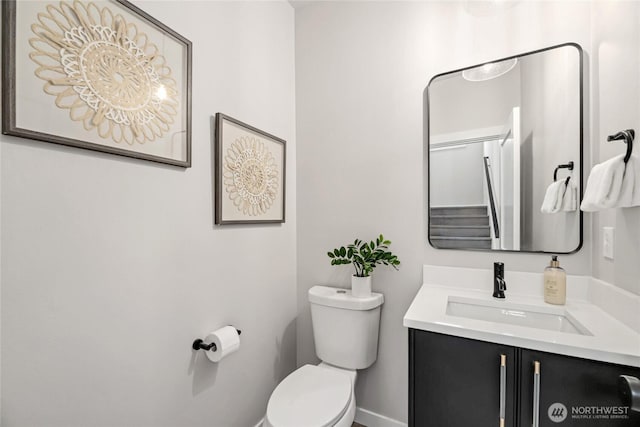 2817 Franklin Ave E Unit A, Seattle, WA 98102 - bathroom featuring toilet, vanity, and baseboards
