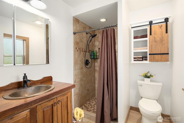 10918 159th Ave SE, Snohomish, WA 98290 - full bathroom featuring toilet, vanity, tiled shower, and baseboards
