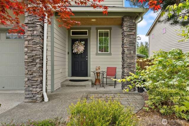 4415 Goldcrest Dr NW, Olympia, WA 98502 - property entrance featuring a garage