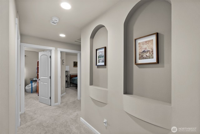 4415 Goldcrest Dr NW, Olympia, WA 98502 - hallway featuring light colored carpet, recessed lighting, and baseboards