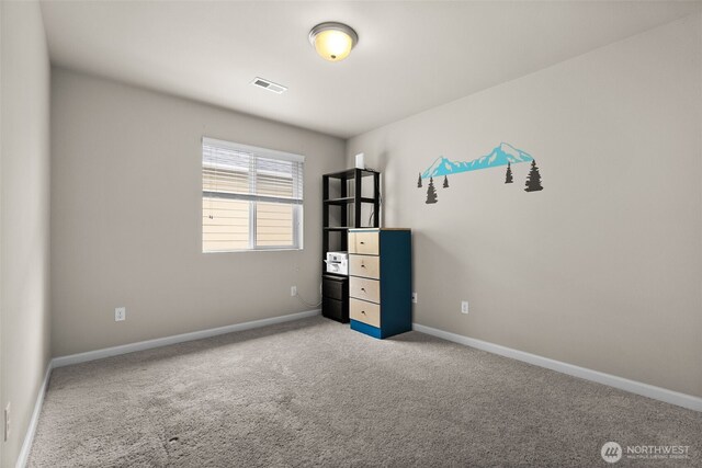 4415 Goldcrest Dr NW, Olympia, WA 98502 - empty room with carpet floors and baseboards