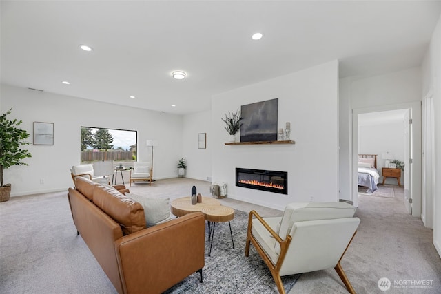 8010 Beverly Blvd Unit A, Everett, WA 98203 - living room with carpet floors, a glass covered fireplace, recessed lighting, and baseboards