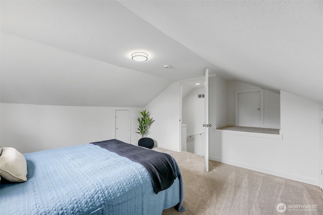 8010 Beverly Blvd Unit A, Everett, WA 98203 - bedroom featuring carpet, lofted ceiling, and baseboards
