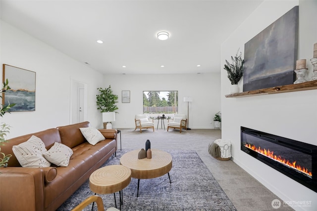 8010 Beverly Blvd Unit A, Everett, WA 98203 - carpeted living area with a glass covered fireplace, recessed lighting, and baseboards